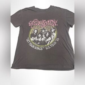 Aerosmith tee shirt women size medium. “ Get your wings US tour 1974”